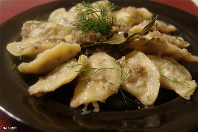 Dumplings with meat and mushroom dressing.