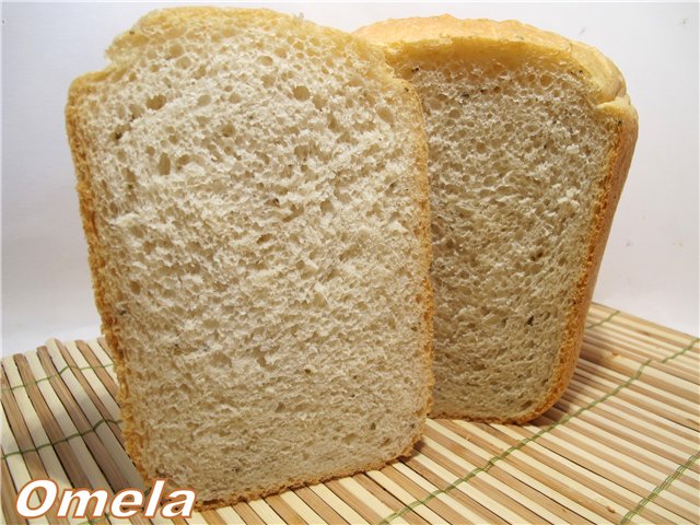 Pane di grano con anice su un impasto in una macchina per il pane