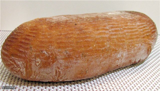 Flan de trigo y centeno de Lituania con semillas de alcaravea (Sventine duona) en el horno