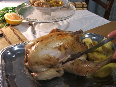 Chicken with potatoes, baked in the oven entirely from the movie Le fabuleux destin d`Amelie Poulain (Amelie)