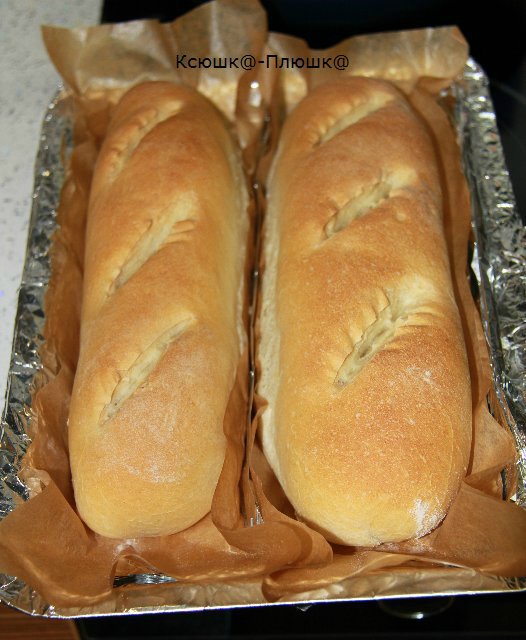 Wheat baguettes on ripe dough in the oven