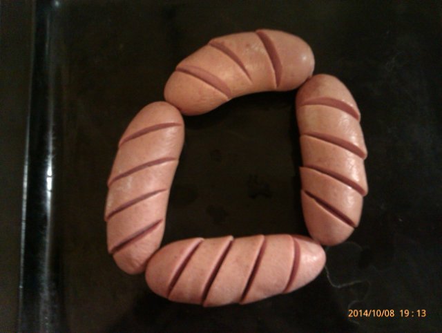 Wurstring im Ofen - sausage ring in German