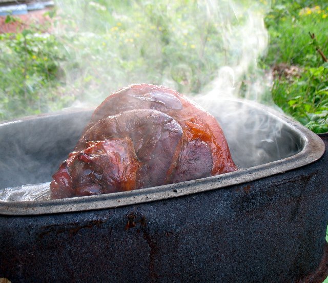 Boar's knee No. 3 smoked and baked on a portable smokehouse and Brand pressure cooker