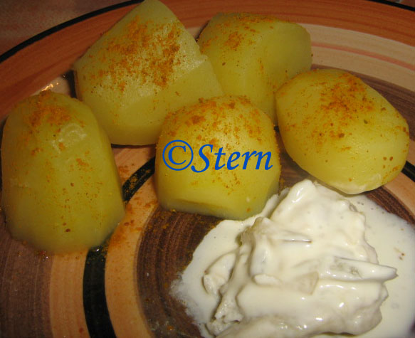Boiled potatoes in Indian style