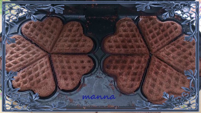 Chocolate shortbread cookies in a waffle iron