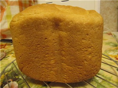 Tarwemelkbrood met havermeel in een broodbakmachine