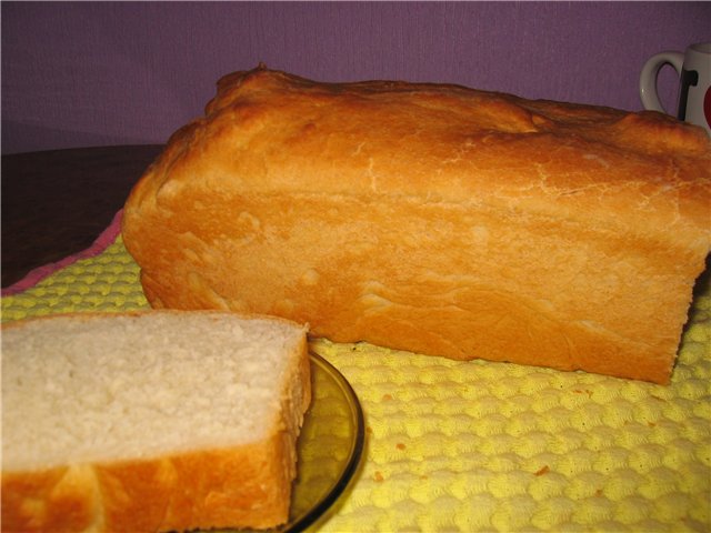 Wheat bread on kefir with cheese in a bread maker