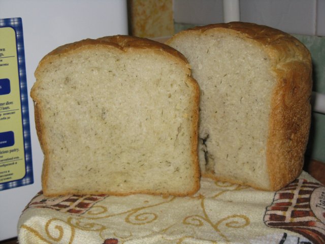 Spicy bread with garlic and herbs in a bread maker