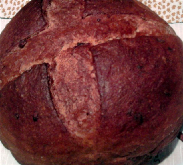 Wheat wheat-rye bread with onions in the oven