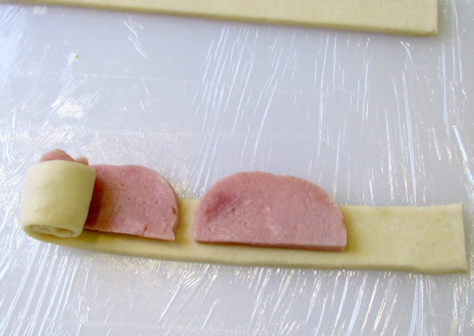 Rose di salsiccia in pasta sfoglia (al forno)