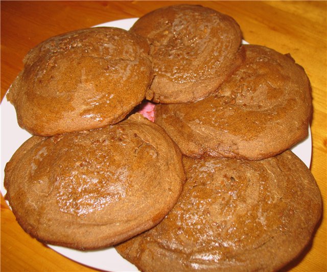 Kolobok (gingerbread man) in the oven