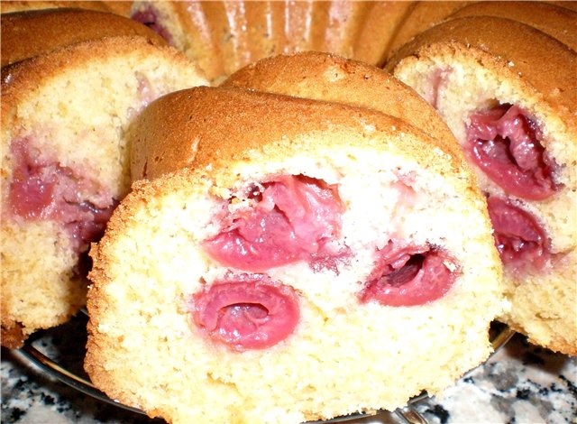 Light cupcake with cherries