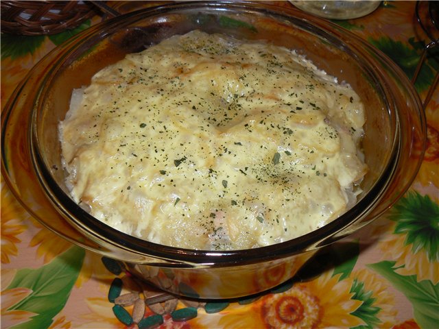 Chicken with sauerkraut and potatoes in the oven