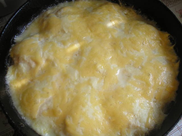 Juicy cutlets in milk sauce in the oven
