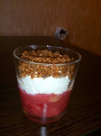 Dessert with berries, cream and toasted oatmeal from Lido