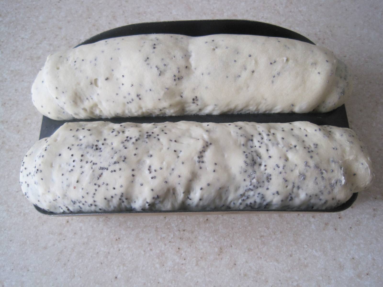 Mini cold dough baguettes in the oven