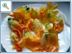 Squash flowers stuffed with cheese and fried in batter