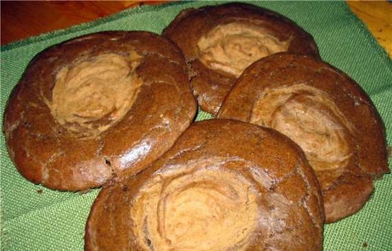 Kolobok (gingerbread man) in the oven