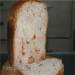 Wheat bread with nuts and dried fruits in a bread maker