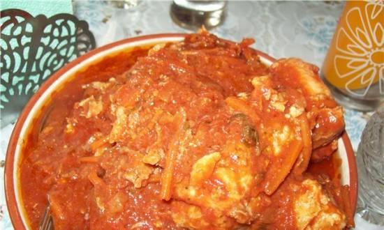 Pickled fish appetizer in tomato sauce