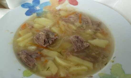 Cabbage soup with sauerkraut in a slow cooker Moulinex Minute Cook