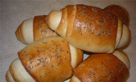 Arrows with caraway seeds on a thick dough