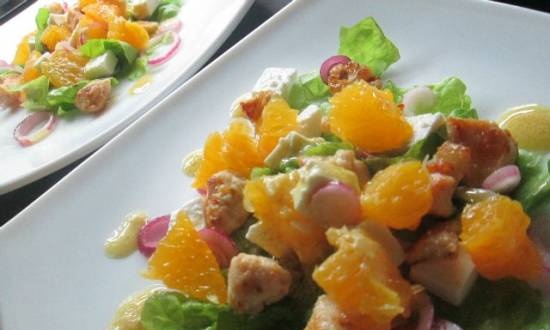 Kipsalade met sinaasappel en pikante dressing