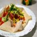 Avocado salad, tomato and corn