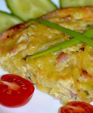 Potato gratin with onions, eggs and ham