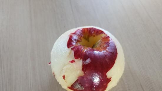 Peeling an apple peel with an electric drill