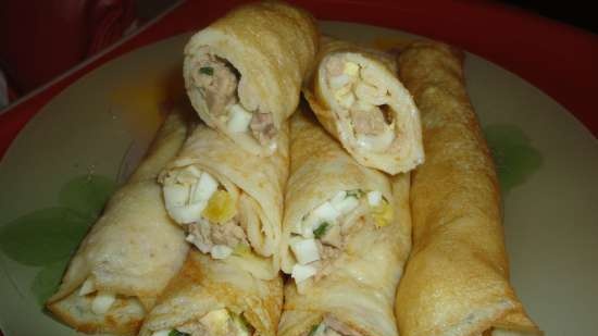 Pancake rolls with cod liver and anchovies