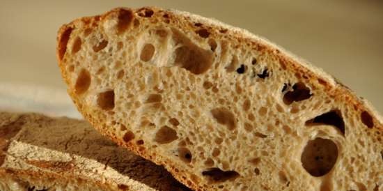 Rustic wheat bread (Pane Bigio) in the oven