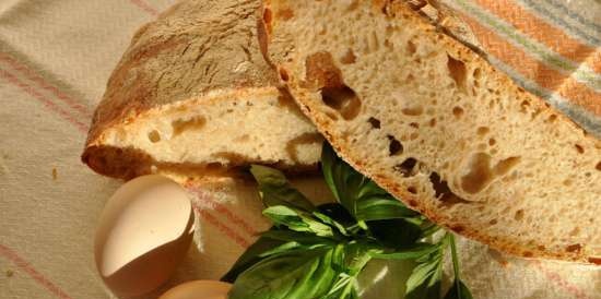 Rustic wheat bread (Pane Bigio) in the oven