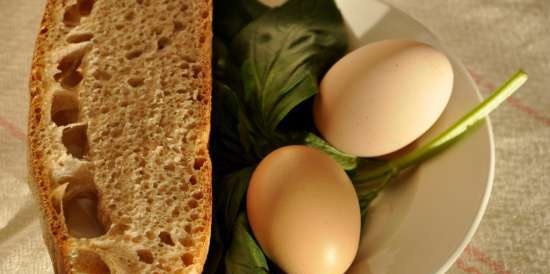 Rustic wheat bread (Pane Bigio) in the oven