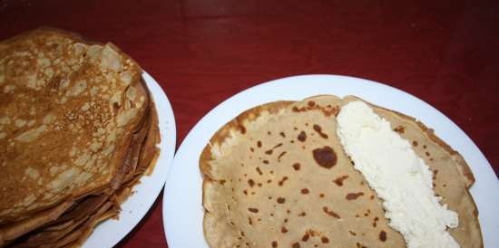 Buckwheat pancakes baked with cheese and cottage cheese