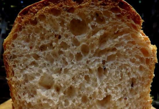 Pane di frumento con semi di lino su pasta vecchia e lievito liquido