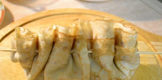 Frittelle con formaggio ed erbe aromatiche cotte al forno con capesante