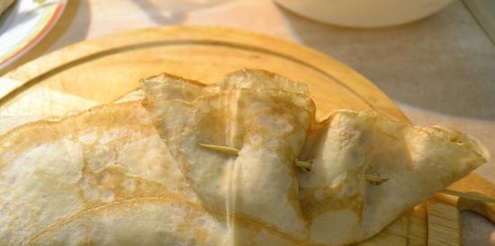 Frittelle con formaggio ed erbe aromatiche cotte al forno con capesante