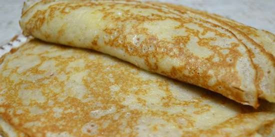 Milk pancakes, butter, on dough from old multigrain dough