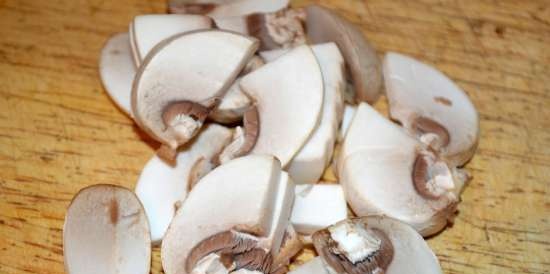 Kalkoenfiletrolletje met champignons en kaas