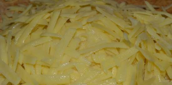 Potato gratin with onions, eggs and ham