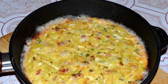 Potato gratin with onions, eggs and ham