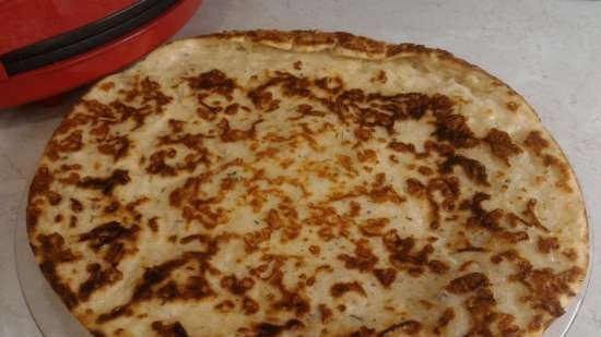 Khachapuri ayuna de una manera diferente en una parrilla de contacto VVK