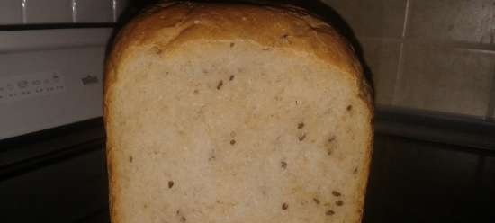 Pane di grano con semi di lino, sesamo e girasole in una macchina per il pane