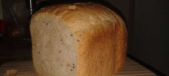 Pane di grano con semi di lino, sesamo e girasole in una macchina per il pane