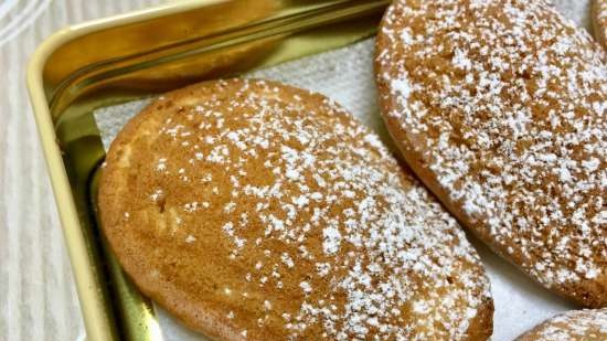 Madeleinekoekjes met zongedroogde bessen, chocolade, walnoten en sinaasappelschil