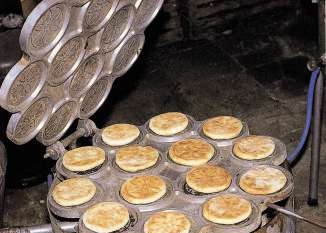 Italian crumpets Tigella (tortillas baked in a pan on dough with lard)