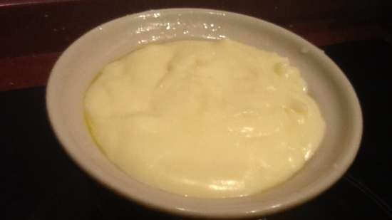 Homemade processed cheese in a milk cooker