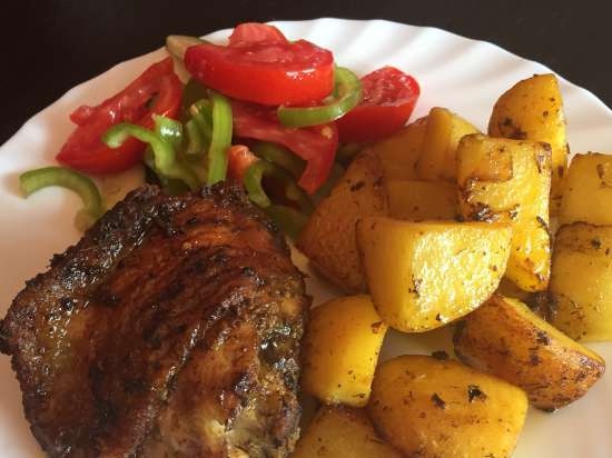 Pollo affumicato e patate rustiche in un multicooker Steba DD2