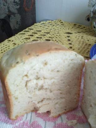 Spicy bread with garlic and herbs in a bread maker